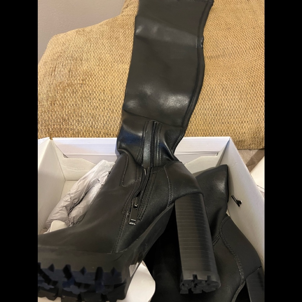 Very sexy black leather thigh high slip on boots with zipper by ankle brand new